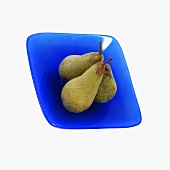 Three pears in blue dish