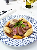 Duck breast with potatoes and carrots