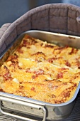 Tomato and mozzarella lasagne in a baking tin