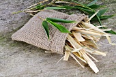 Strips of bamboo cane in small sack