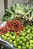 Limes and chillies on a market stall in Thailand