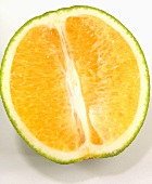 Half a green-skinned orange