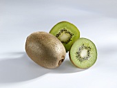 Kiwi fruit, whole and halved