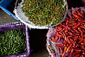 Red and green chillies at a market in Bangkok