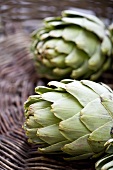 Two artichokes in basket