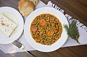 Pea and carrot stew with feta cheese