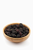 Mulberries in a wooden bowl