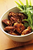 Chicken wings with spring onions