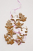 Gingerbread biscuits with icing sugar and sliver pearls