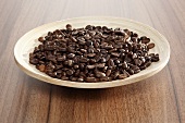 A plate of roasted coffee beans