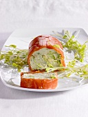 Avocado and salmon roulade with bean sprouts