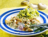 Chicken breast with oyster mushroom sauce and green tagliatelle