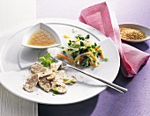 Steamed chicken breast with vegetables, sesame and vinaigrette