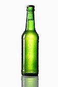 Green bottle of beer with drops of water