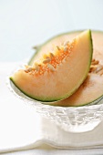 Charentais melon in glass dish
