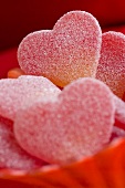 Red, sugared jelly hearts in a dish