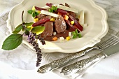 Fillet of wild hare in cream sauce with autumn vegetables