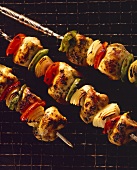 Chicken kebabs with peppers and onions
