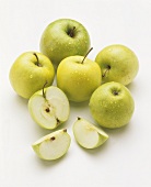 Golden Delicious & Granny Smith apples with drops of water