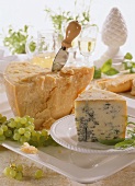 A piece of Gorgonzola & a piece of Parmesan with cheese knife