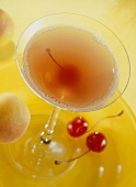 A Manhattan with cocktail cherry