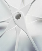White corner spoons arranged in a star shape