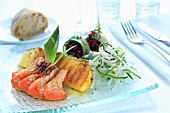 Salmon with teriyaki sauce, pineapple and julienne vegetables