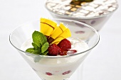 Peach mousse with raspberries and mint
