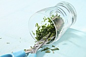 Cut parsley with scissors in an upturned glass