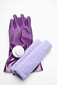 Purple rubber gloves, brush and cloth