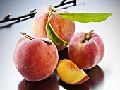 Yellow Florentine peaches with leaves