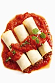 Cannelloni with mince filling and tomato sauce