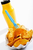 Potato wedges and mustard