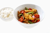 Fried lemon chicken with vegetables and rice