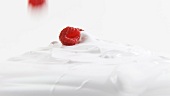 Cream with raspberries