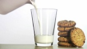 A glass of milk and biscuits