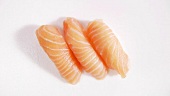 Three salmon nigiri sushi