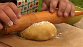 Rolling out a ball of dough