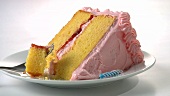 A piece of strawberry cream cake