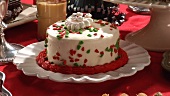 Gingerbread house and sweet baking on Christmas cake buffet