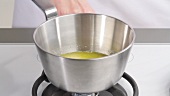 Butter being melted in a saucepan