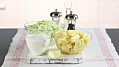 Potatoes, milk and savoy cabbage (ingredients for Bubble & Squeak, England)
