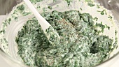 Spinach and ricotta being mixed