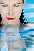 Woman relaxing in pool