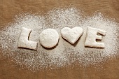 'LOVE' biscuits with icing sugar