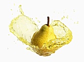 Pear with splashing pear juice