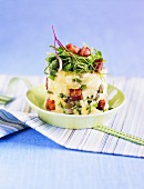 Potato tower with bacon and herbs