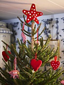Christmas tree with red fabric ornaments