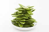Mangetout (stacked) on plate