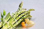 Green asparagus and physalis